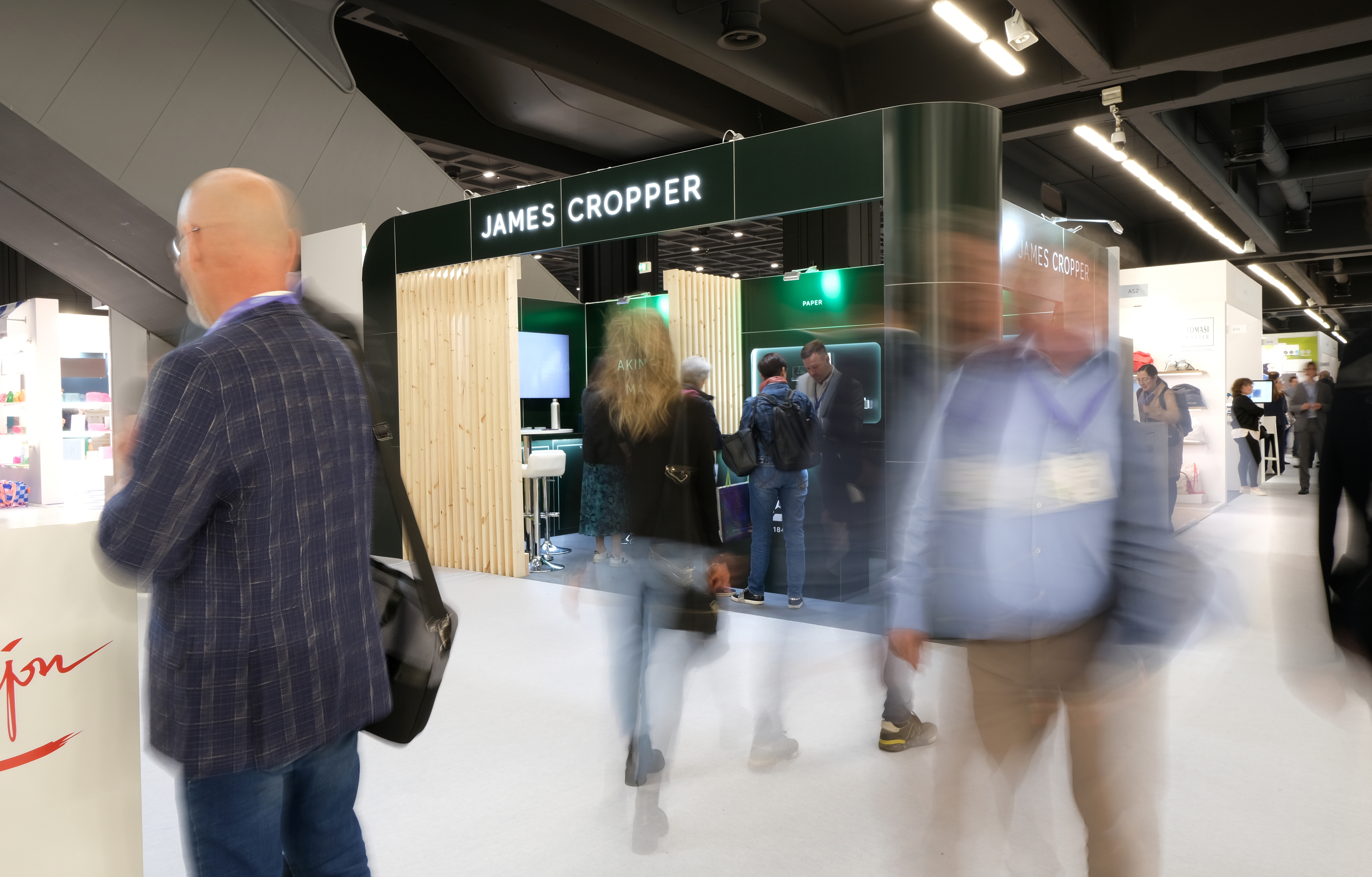 Long shutter photograph showing the stand as visitors come and go