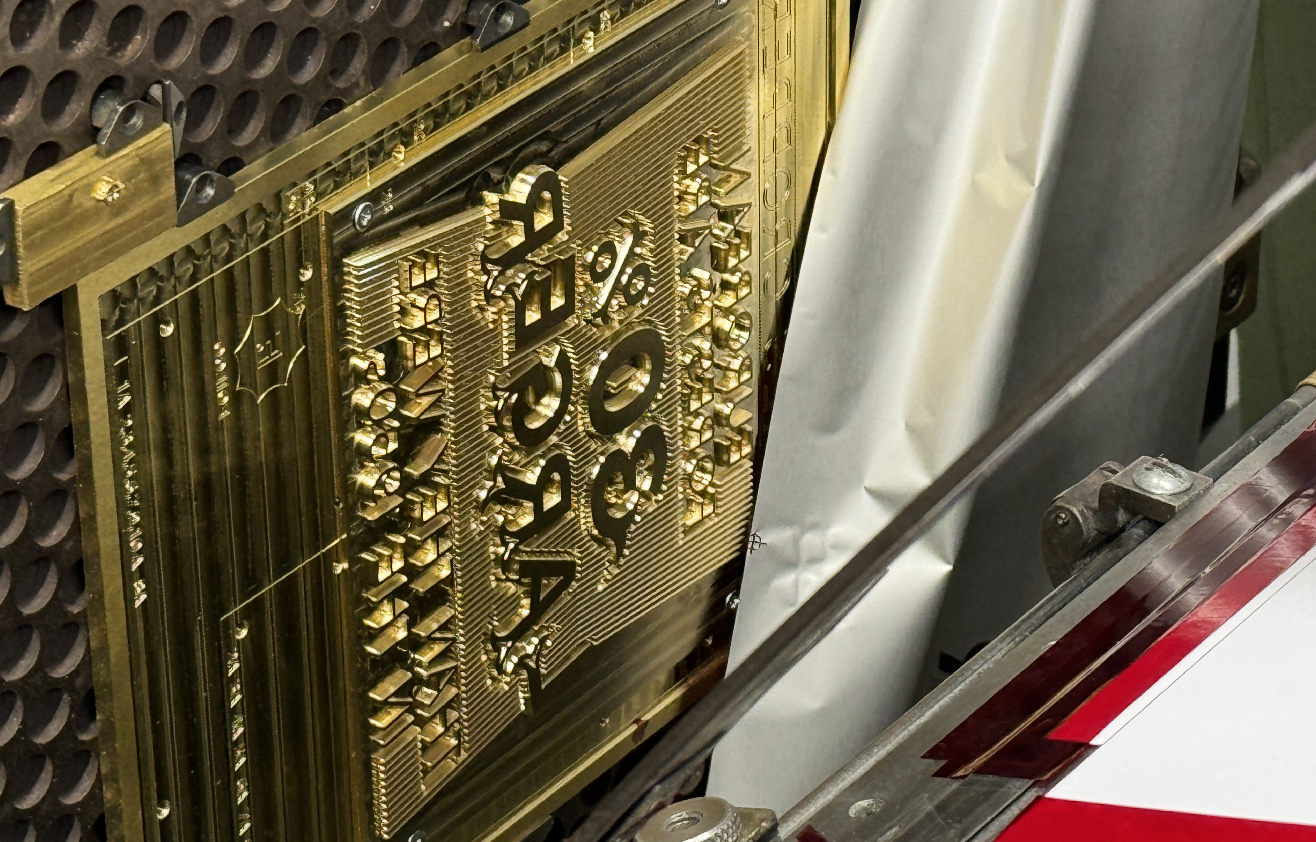 Close up of the brass printing plates
