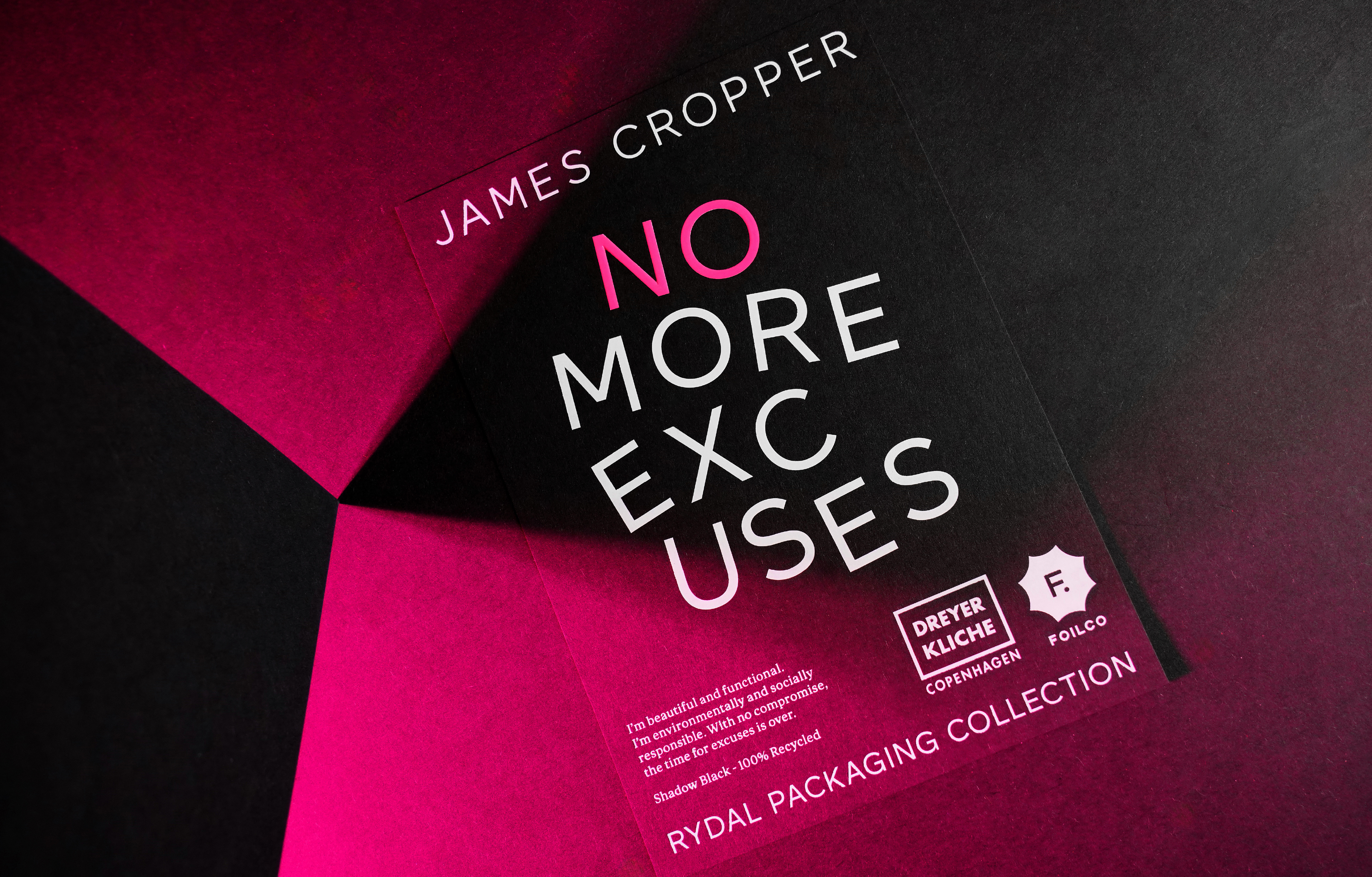 Print with the statement 'No more excuses' in white and pink foil on black paper stock