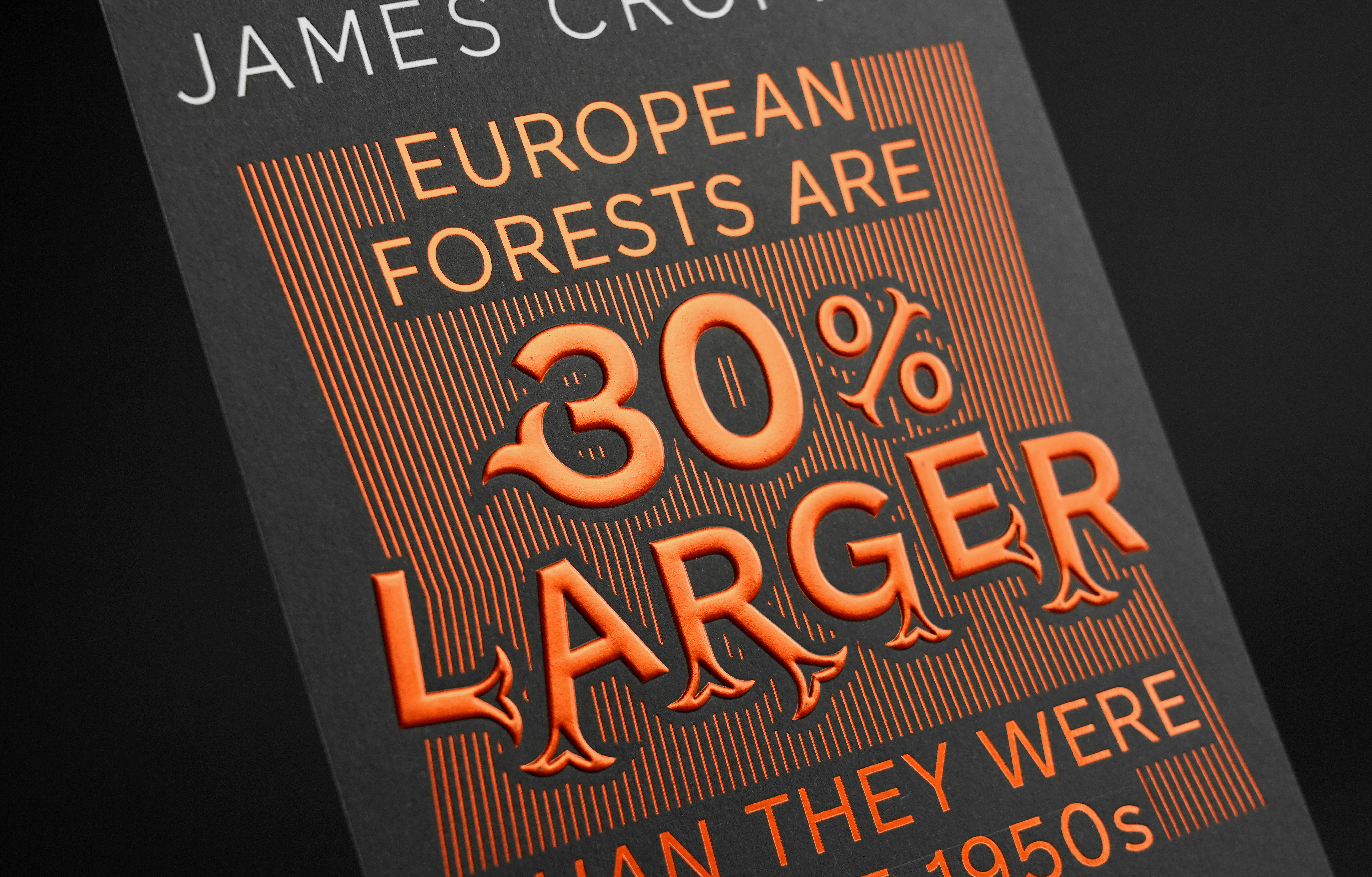 Emboss and brass foil detail for the statement: European Forests are 30% larger than they were in the 1950's