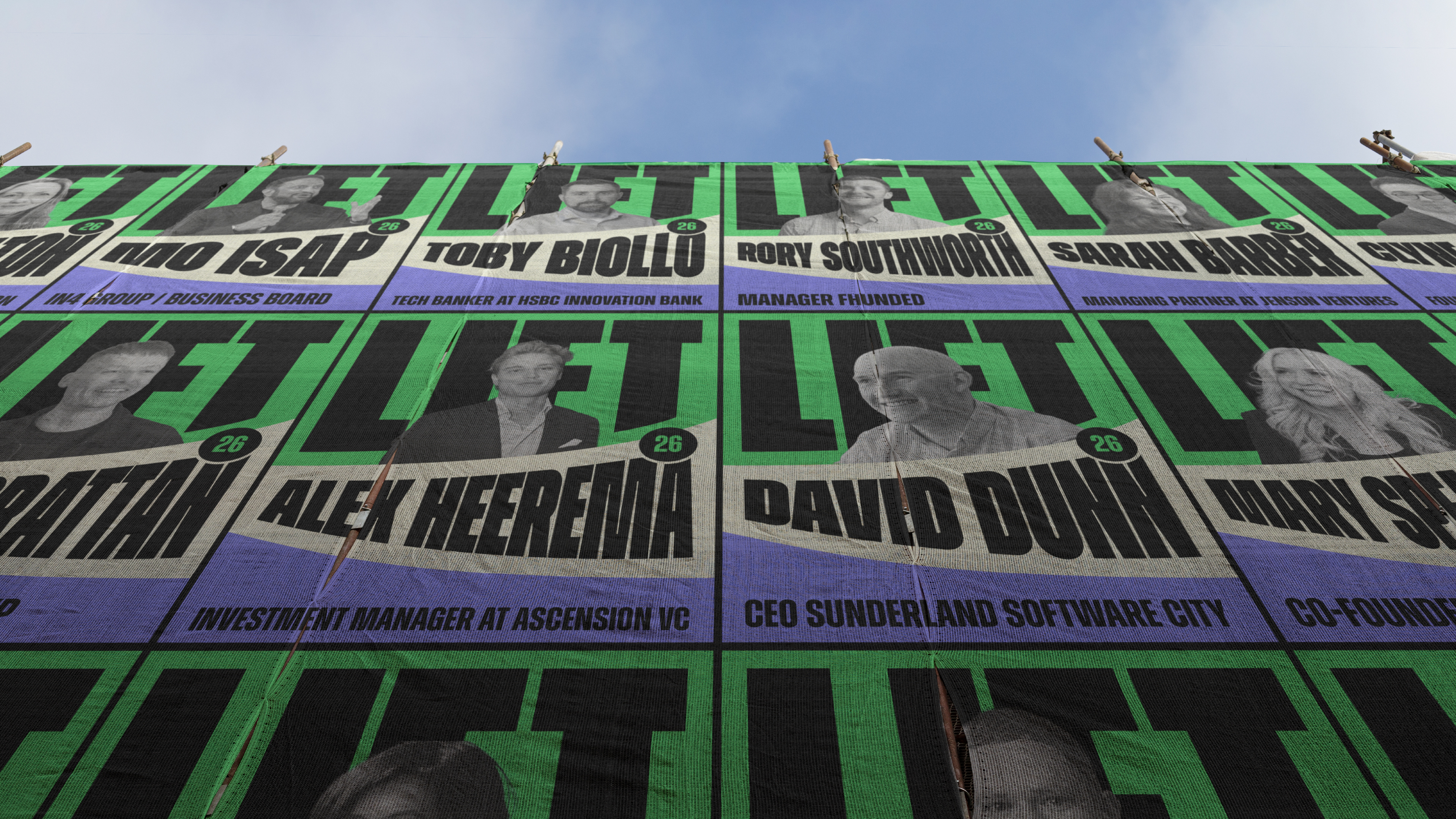 A hoarding covered from top to bottom in LIFT Speaker posters. The view is from the bottom, looking up and the sky is visible.