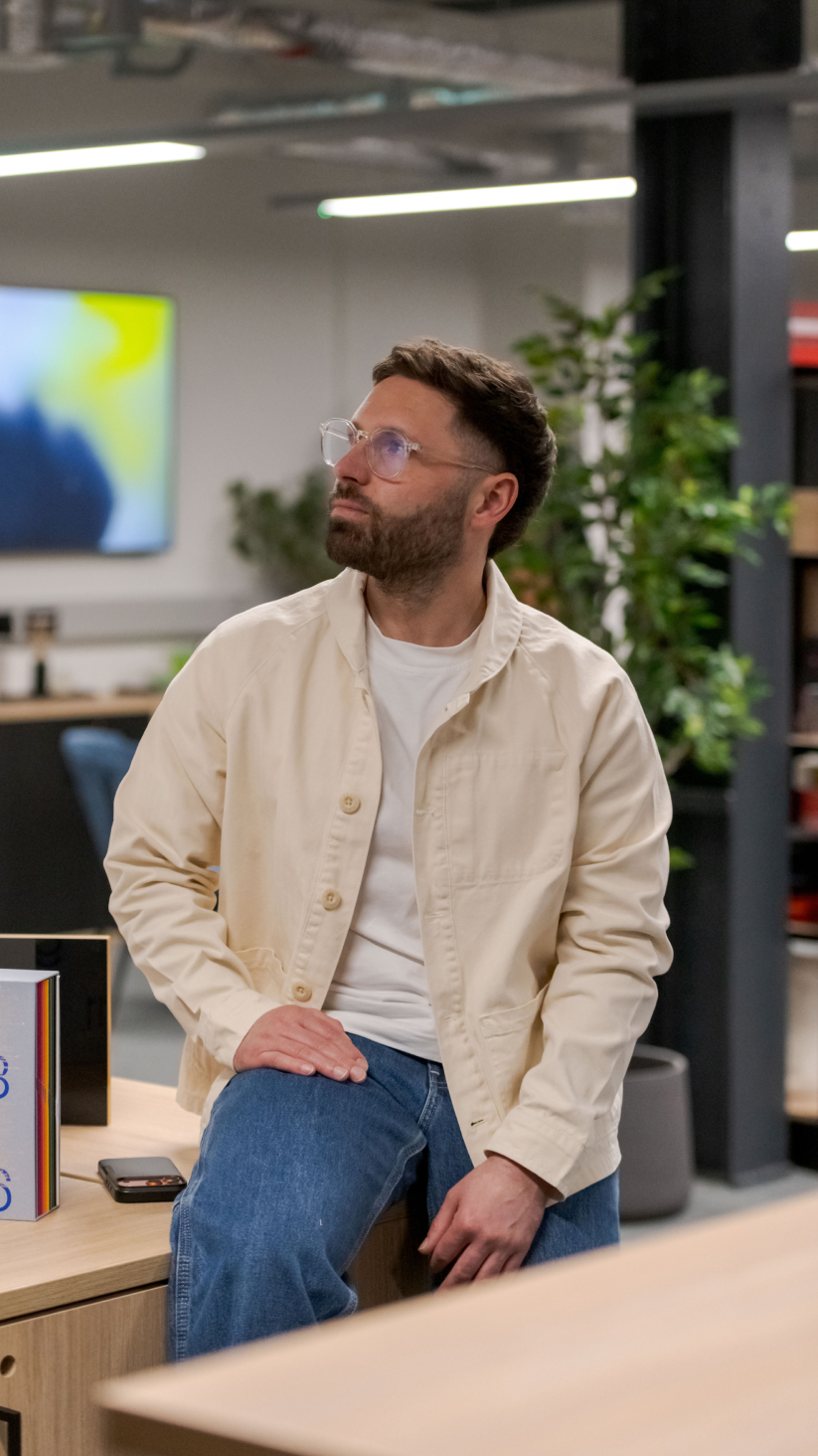 EXP staff/person sat on a desk