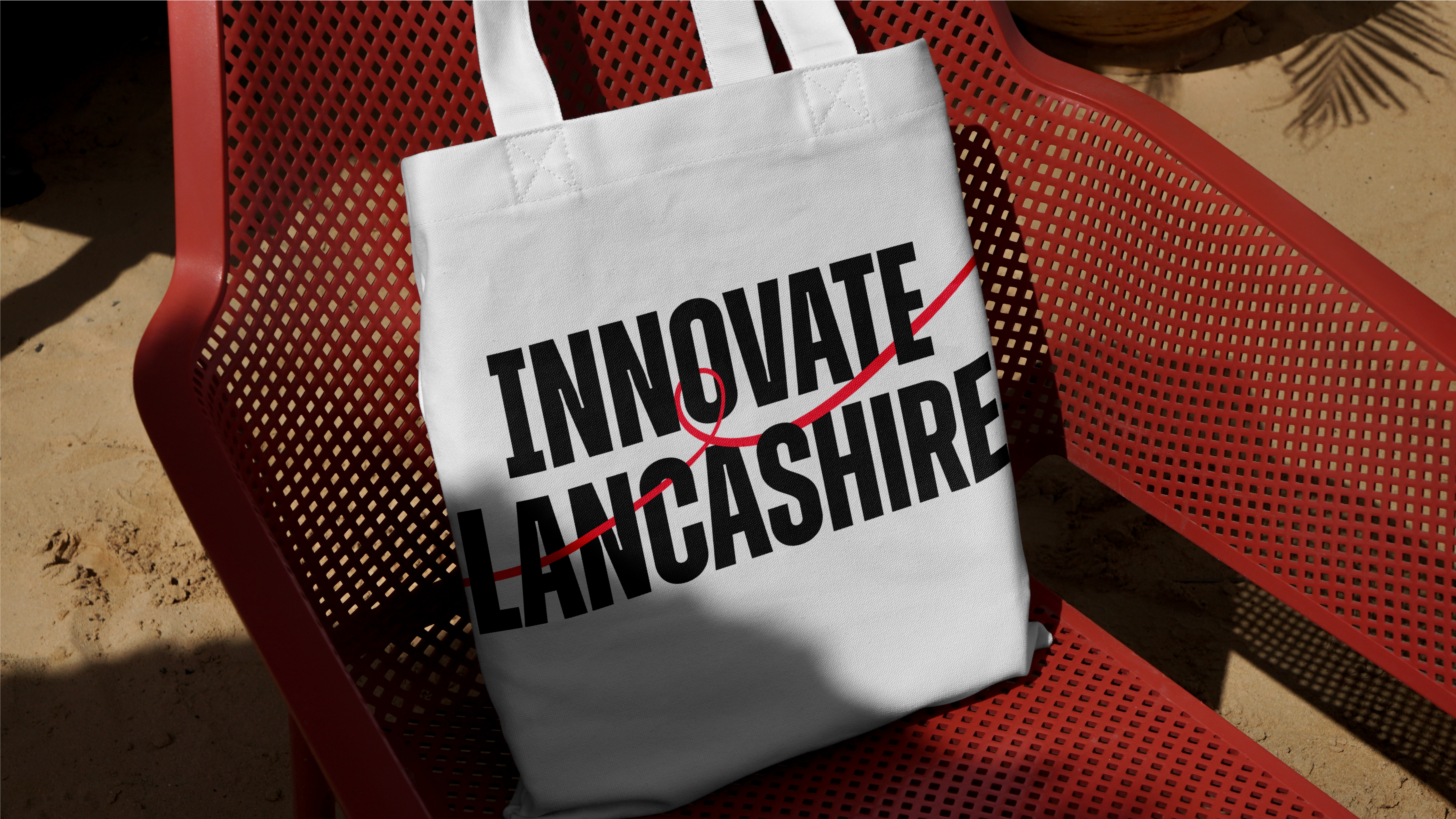 Innovate Lancashire tote bag on chair