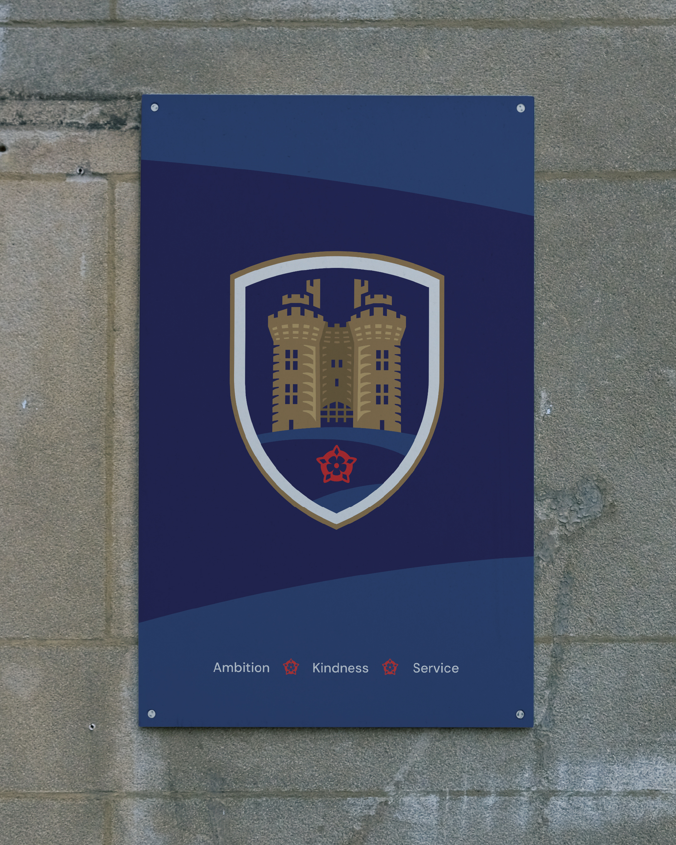 The three values of Lancaster High School, presented on a poster: Ambition, Kindness, Service